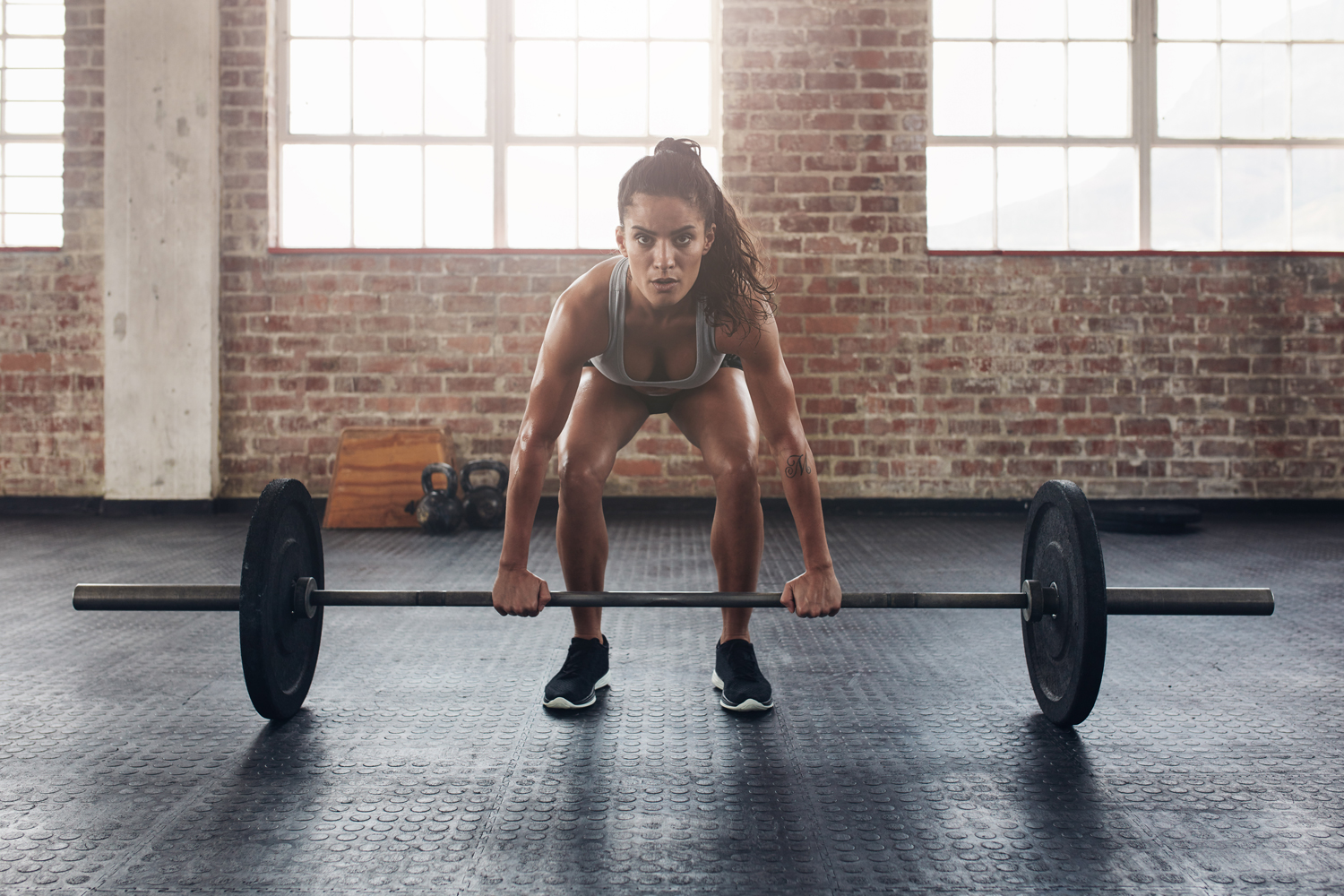 Lower back pain after deadlifts? Why it happens and how to fix it, according to a trainer